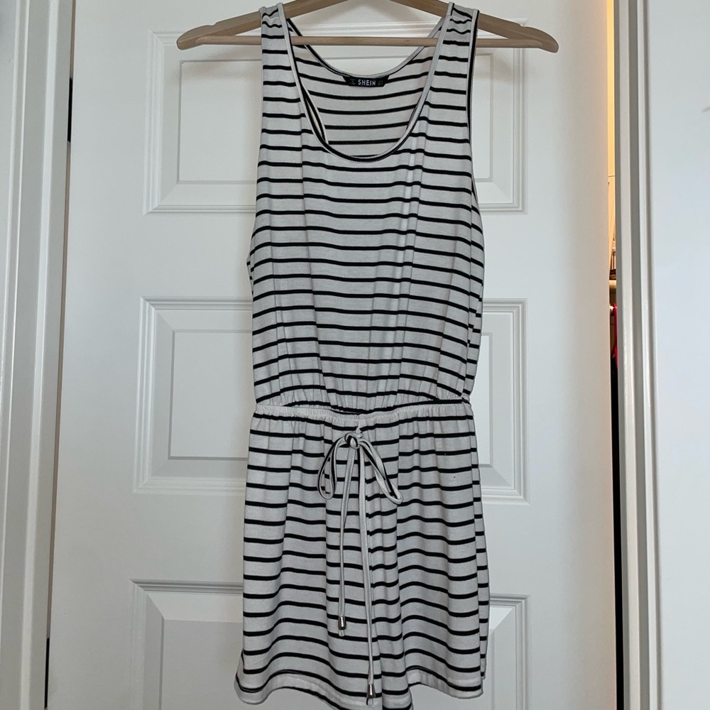 Black and white striped romper.